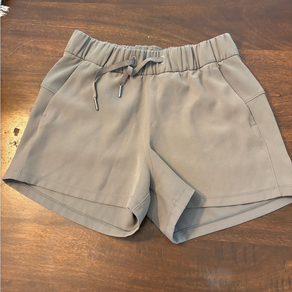 Lululemon Green Athletic Shorts with Elastic Waistband and Relaxed Fit